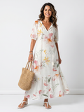 Tiered Midi Dress with Pom Poms and Soft Floral Print