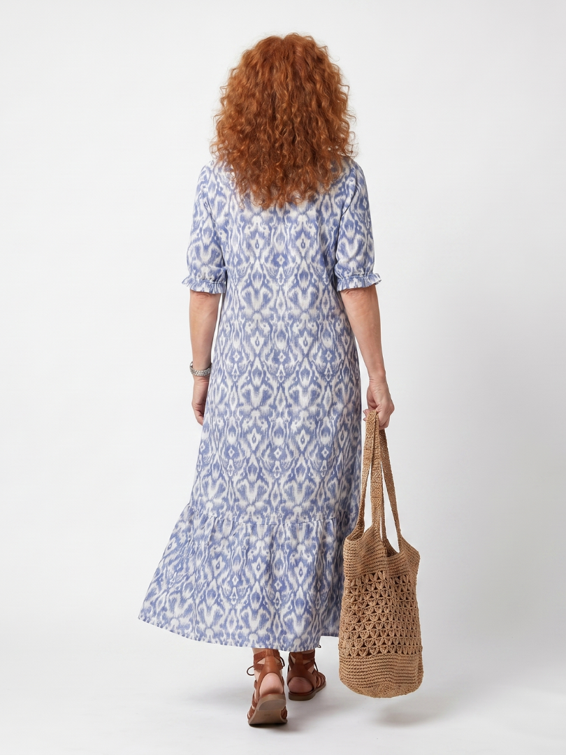 Printed Midi Dress with Tie Neck and Pom Poms