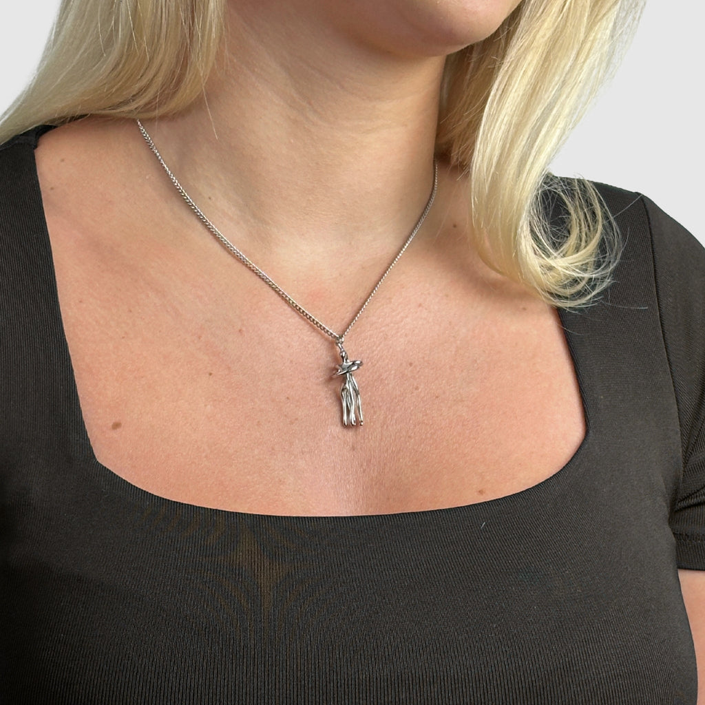 The Embrace Necklace Symbol of Love and Tenderness