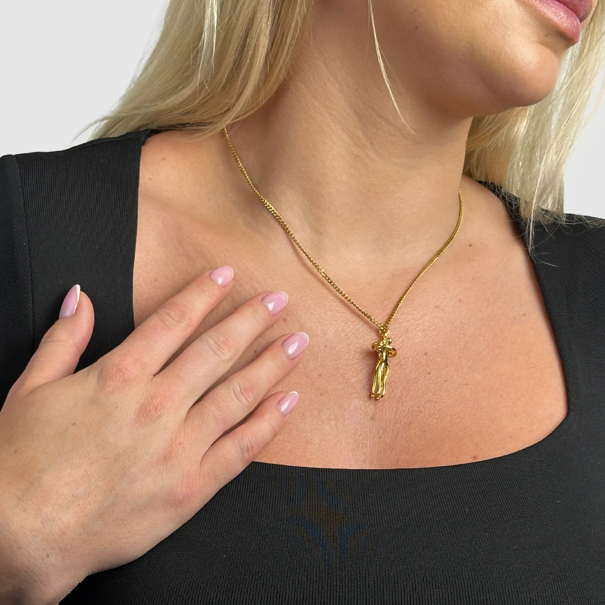 The Embrace Necklace Symbol of Love and Tenderness