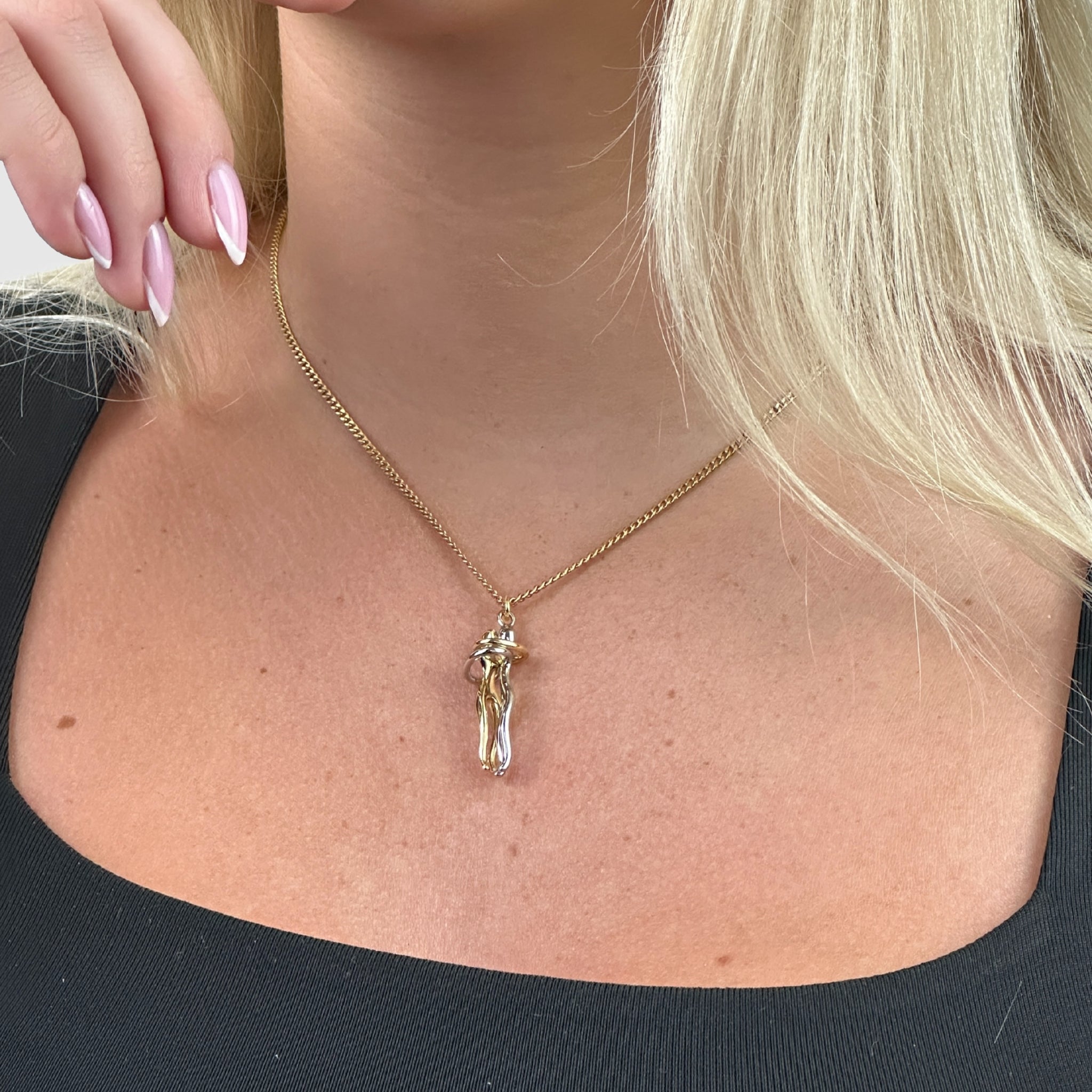 The Embrace Necklace Symbol of Love and Tenderness